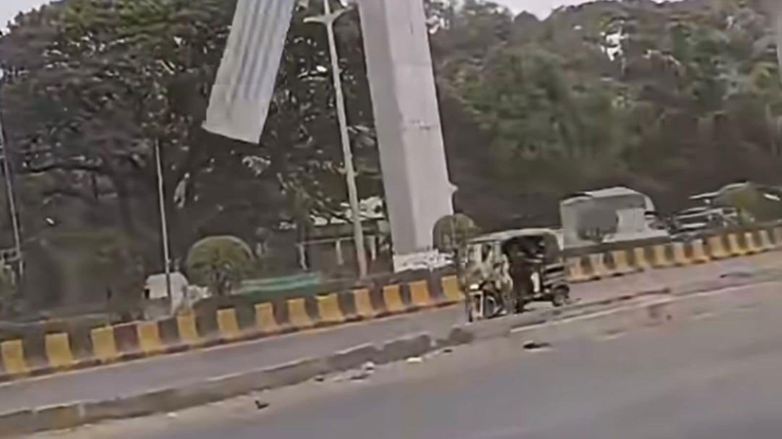 biker-escapes-narrowly-after-winds-dislodge-steel-sheet-from-pune-metro-site