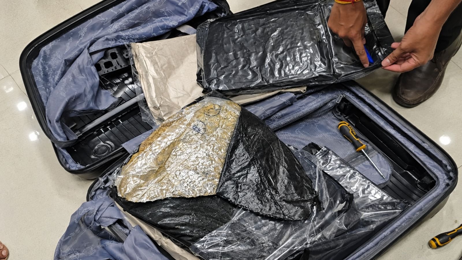 black-trolley-bag,-hidden-cavities:-how-officials-seized-rs-44-lakh-weed-at-pune-airport